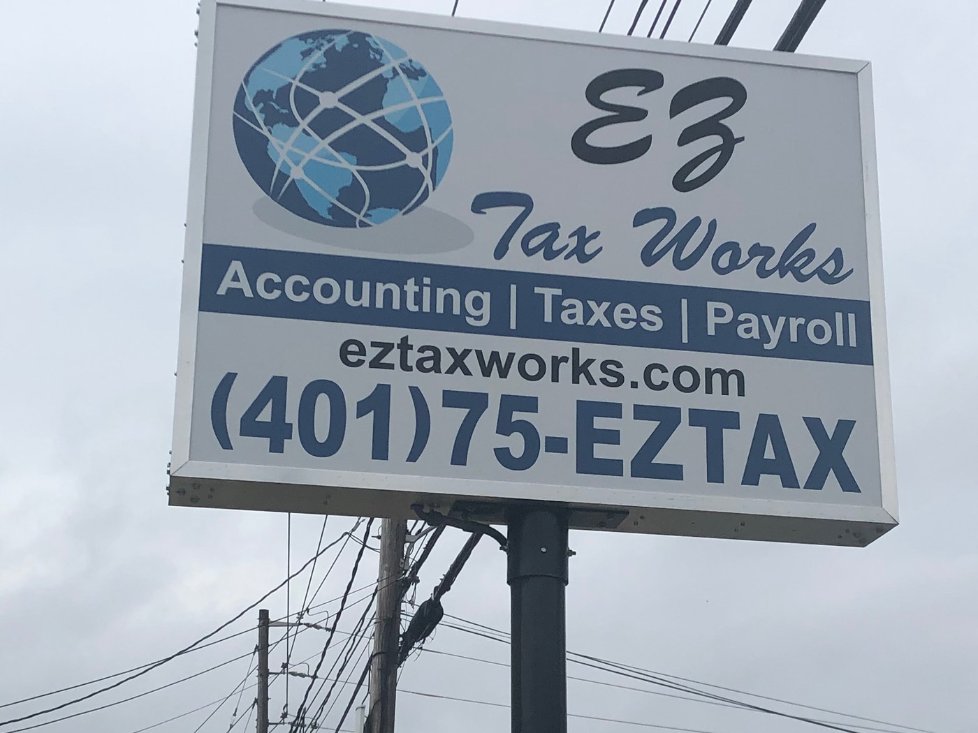 EZ Tax Works LLC sign board outside the Cumberland, Rhode Island office